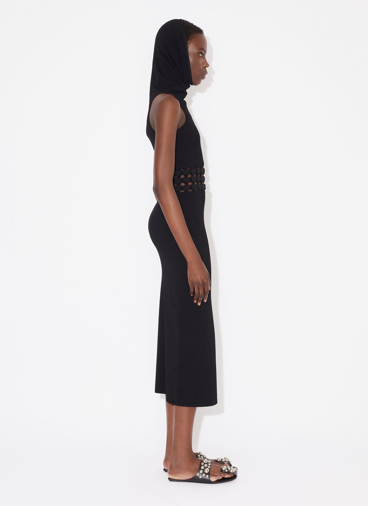 KLEID MIT KAPUZE MIT 3D-PERFORATIONEN ALAÏA SCHWARZ KLEID MIT KAPUZE MIT 3D-PERFORATIONEN